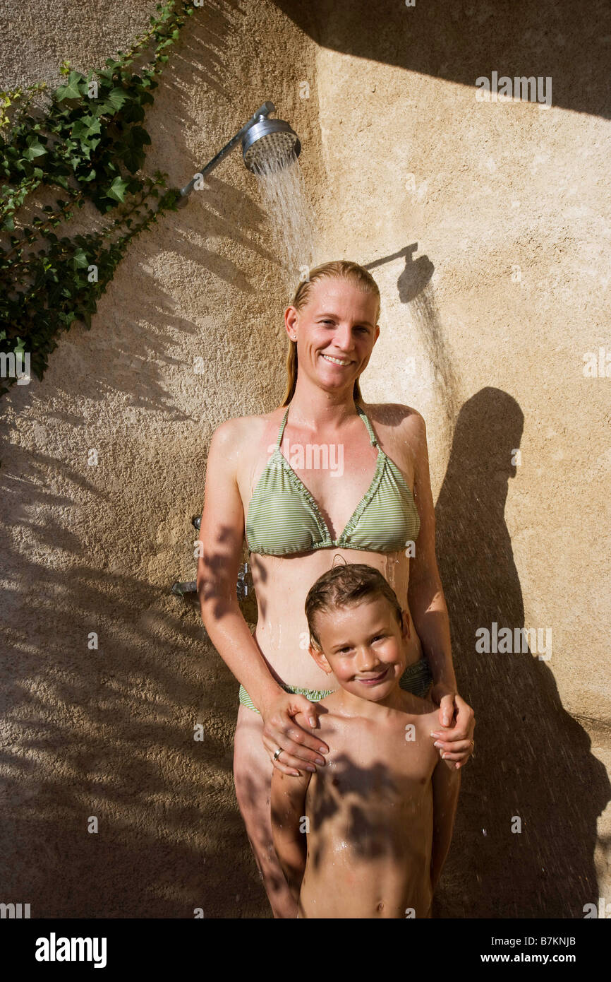 Mother and daughter in shower